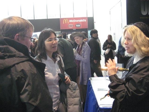 Noreen Grice, as Maria Mitchell,answers questions from museum visitors at the National Air & Space Museum