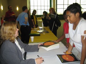 Noreen signs book copies