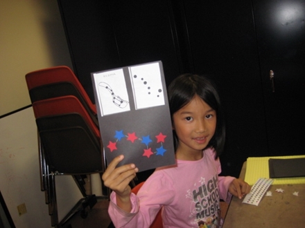Girl with Star Book