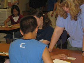 Student_With_Tactile_Pictures_of_Moon_Phases