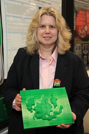 Noreen Grice holds the 3D model of NGC 602, presented at an American Astronomical Society conference